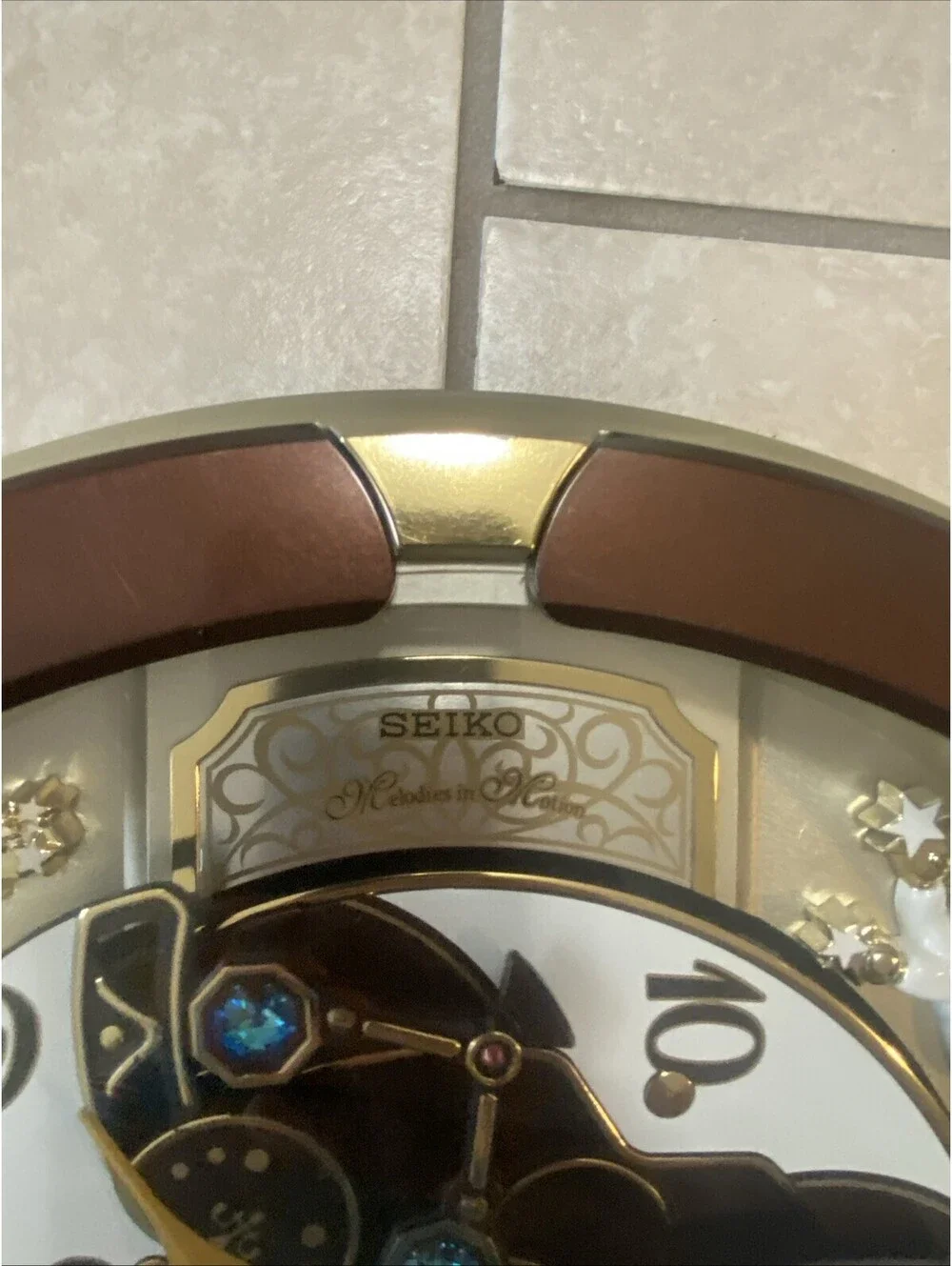 Melodies in Motion Musical Wall Clock,Spring Dance Adjustable Volume,16